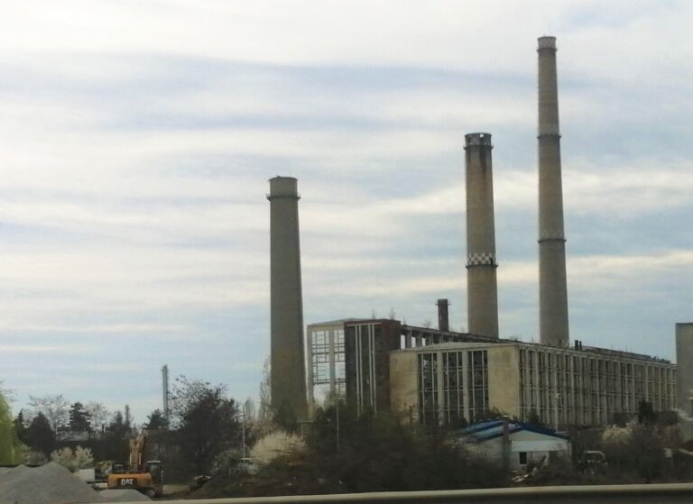 An old disused power station in Romania with large chimneys