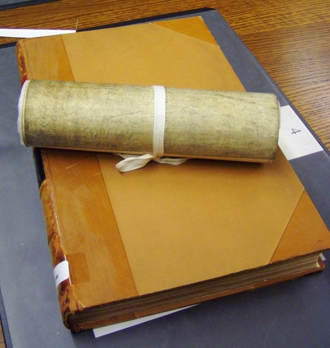 Parchment roll and statute book from the house of commons library