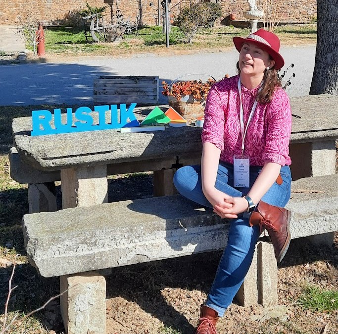 Bryonny sat at a picnic bench