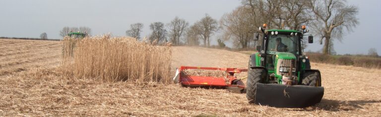 Tractor cutting crop