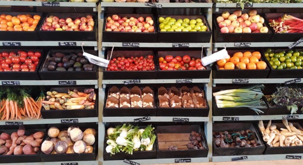 a bright vibrant selection of vegetables in boxes